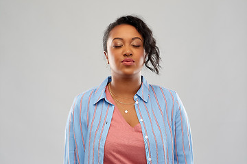 Image showing african american woman waiting for kiss