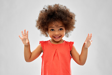 Image showing happy little african american girl over grey