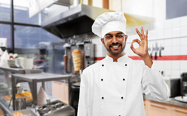 Image showing indian chef in toque showing ok at kebab shop