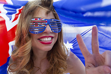 Image showing Patriotic woman showing peace sign