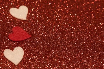 Image showing Hearts over red abstract background with bokeh