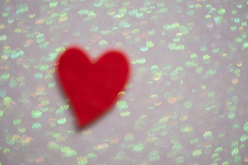 Image showing Blurred heart over abstract background with bokeh