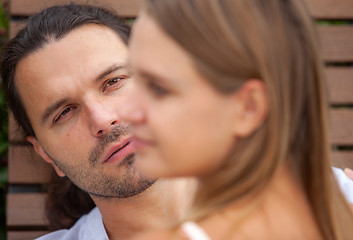 Image showing portrait of a man talking to a woman