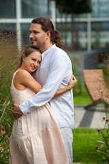 Image showing Pregnancy. A young man and a pregnant woman