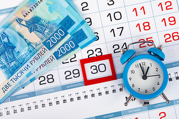 Image showing calendar with the number 30, hours, Russian money