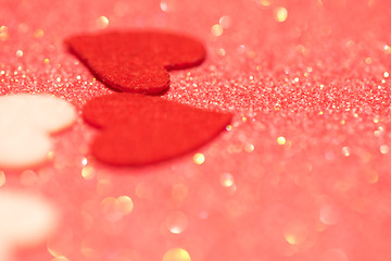 Image showing Hearts over pink abstract background with bokeh