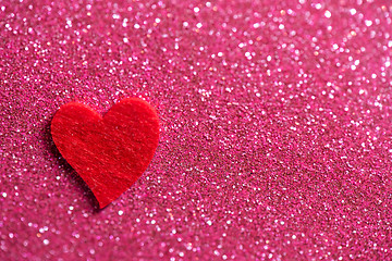 Image showing Heart over pink abstract background with bokeh