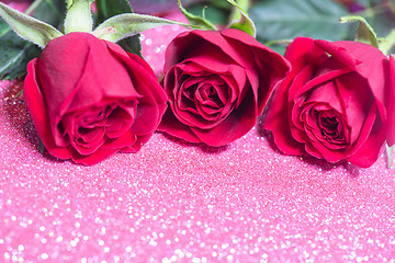 Image showing Roses over pink abstract background with bokeh