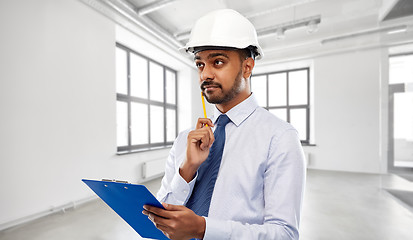 Image showing architect or businessman in helmet with clipboard