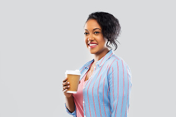 Image showing happy african american woman drinking coffee