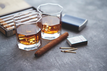 Image showing Carafe of Whiskey or brandy, glasses and box of finnest Cuban cigars