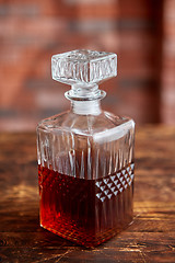 Image showing Elegant carafe filled with whiskey, bourbon or rum