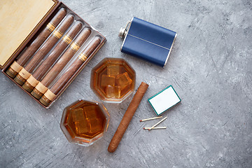 Image showing Carafe of Whiskey or brandy, glasses and box of finnest Cuban cigars