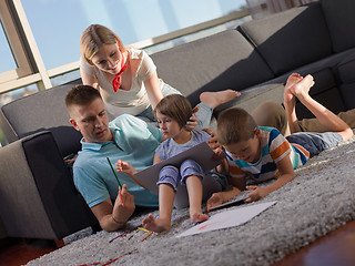 Image showing young happy couple spending time with kids