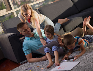 Image showing young happy couple spending time with kids