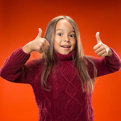 Image showing The happy teen girl standing and smiling