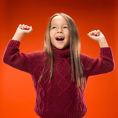 Image showing The happy teen girl standing and smiling