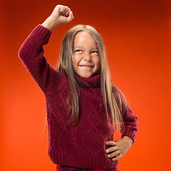 Image showing Portrait of angry teen girl on studio background