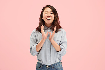 Image showing Beautiful woman looking suprised isolated on pink