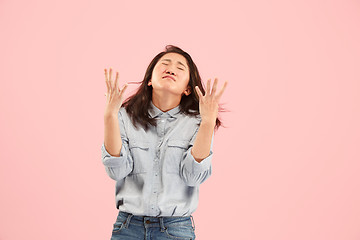 Image showing Beautiful woman looking suprised and bewildered isolated on pink