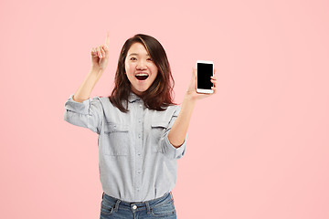 Image showing Portrait of a confident casual girl showing blank screen mobile phone