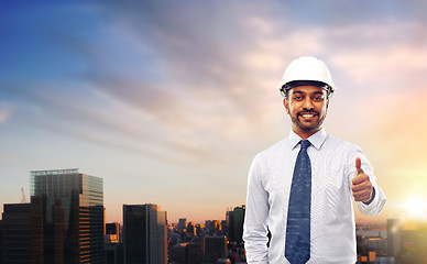 Image showing architect or businessman in helmet shows thumbs up