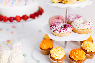 Image showing food and drinks on table at birthday party