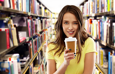 Image showing teenage student girl drinking coffee at library