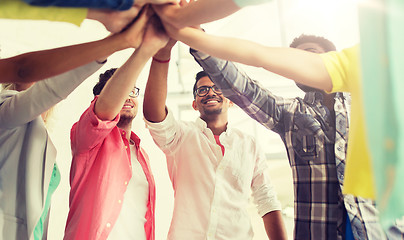 Image showing group of international students making high five