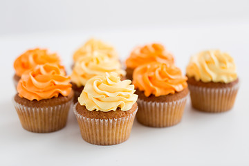 Image showing cupcakes with frosting on white background