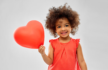 Image showing african american girl with heart shaped balloon