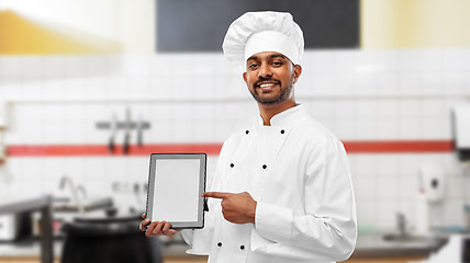 Image showing indian chef with tablet pc at restaurant kitchen