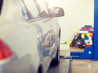 Image showing car on lift at repair station