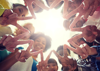 Image showing international students showing peace or v sign