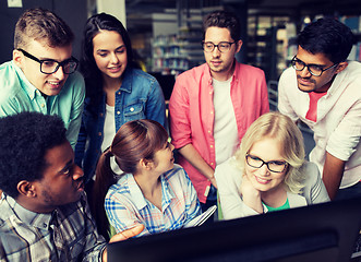 Image showing international students with computers at library