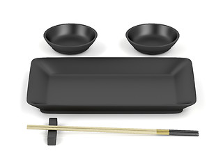 Image showing Chopsticks and empty sushi plates