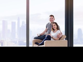 Image showing couple using tablet at home