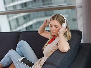 Image showing girl enjoying music through headphones