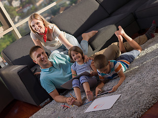 Image showing young happy couple spending time with kids