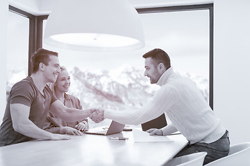 Image showing Startup Business Team At A Meeting at modern office building