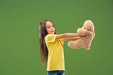 Image showing The happy teen girl standing and smiling