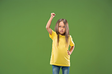 Image showing Portrait of angry teen girl on studio background