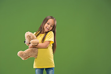 Image showing The happy teen girl standing and smiling