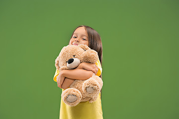 Image showing The happy teen girl standing and smiling