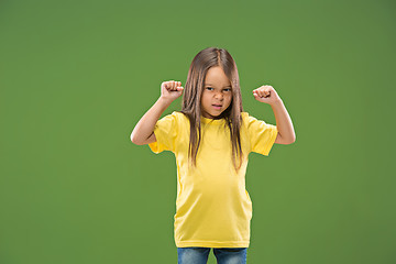 Image showing Portrait of angry teen girl on studio background