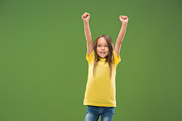 Image showing The happy teen girl standing and smiling