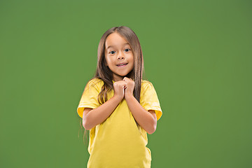 Image showing The happy teen girl standing and smiling