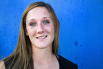 Image showing Close up on a Beautiful Girl with Blue Background