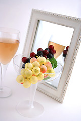 Image showing Isolated Grapes In a Glass