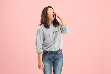 Image showing Beautiful bored woman bored isolated on pink background